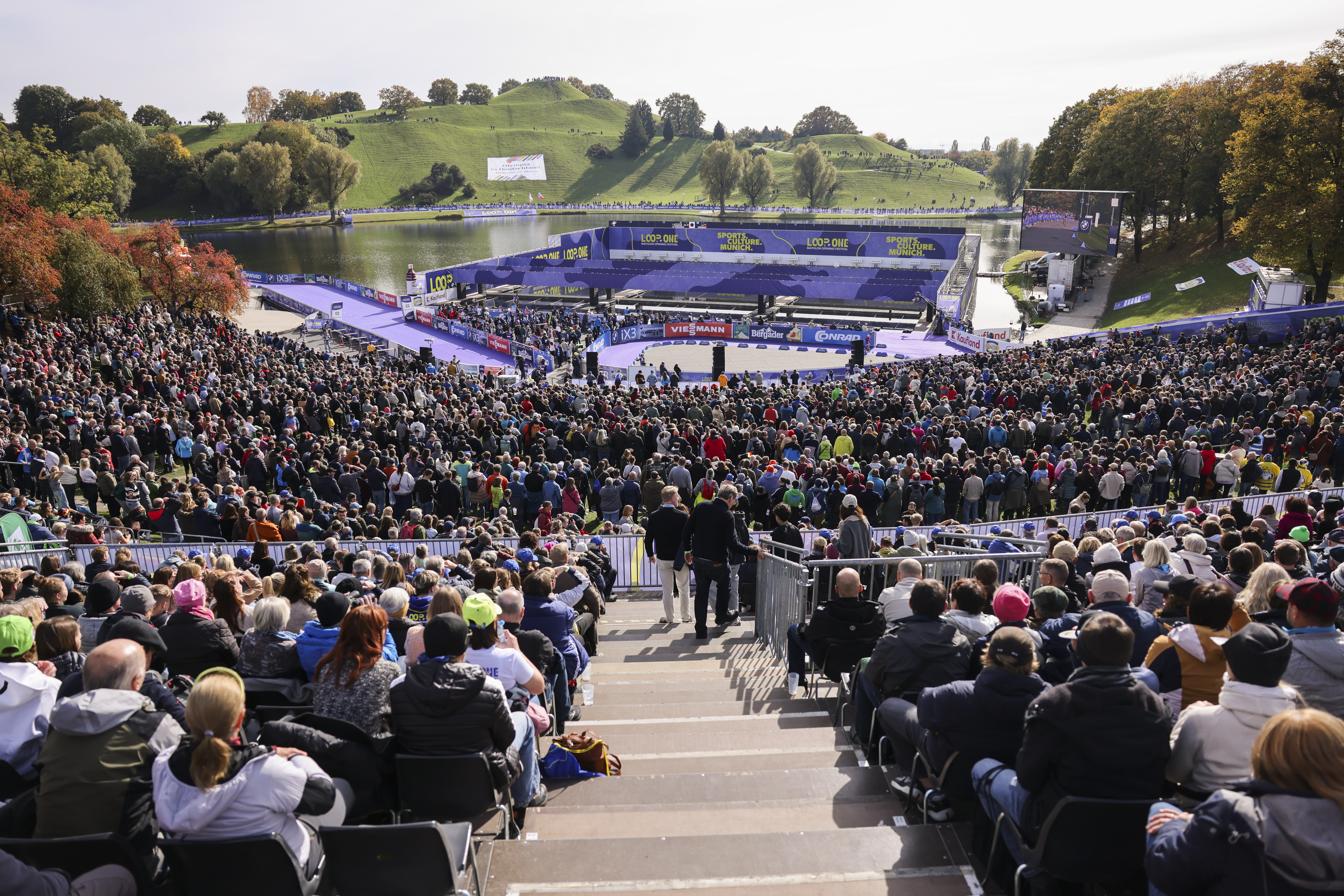 19.10.2025, Munich, Germany (GER):
Event Feature: Overview over parts of the stadium with the venue dressing - Loop One Biathlon Opening Festival - Munich (GER). www.biathlonworld.com © Manzoni/IBU. Handout picture by the International Biathlon Union. For editorial use only. Resale or distribution is prohibited.