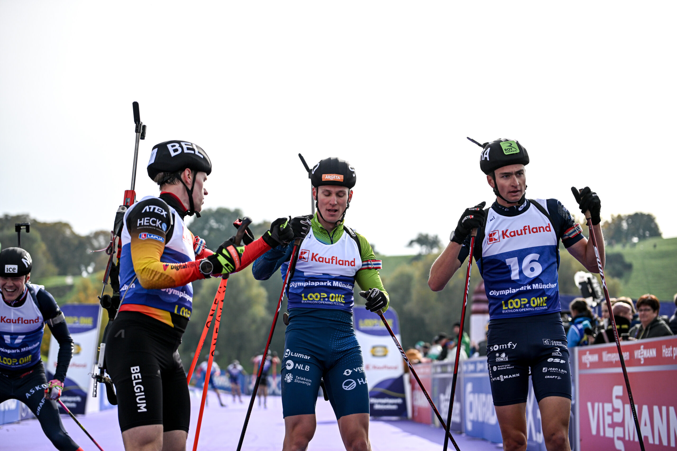 19.10.2025, Munich, Germany (GER):
Thierry Langer (BEL), Anton Vidmar (SLO), Eric Perrot (FRA), (l-r) - Loop One Biathlon Opening Festival - Munich (GER). www.nordicfocus.com. © Authamayou/NordicFocus. Every downloaded picture is fee-liable.